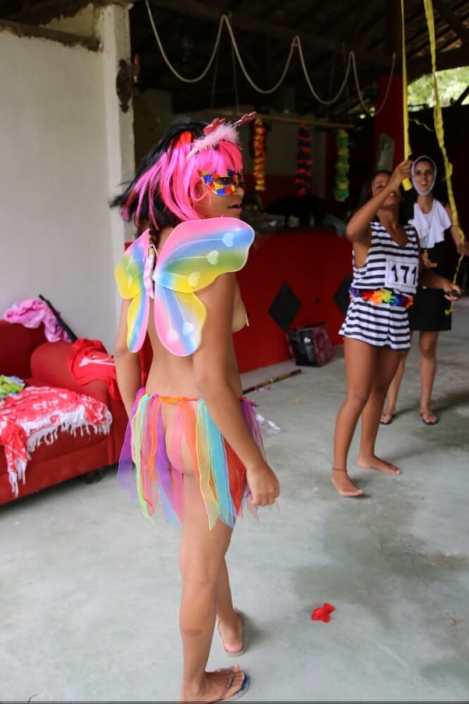 Tropical carnival photo gallery - Family nudism in its cultural context
