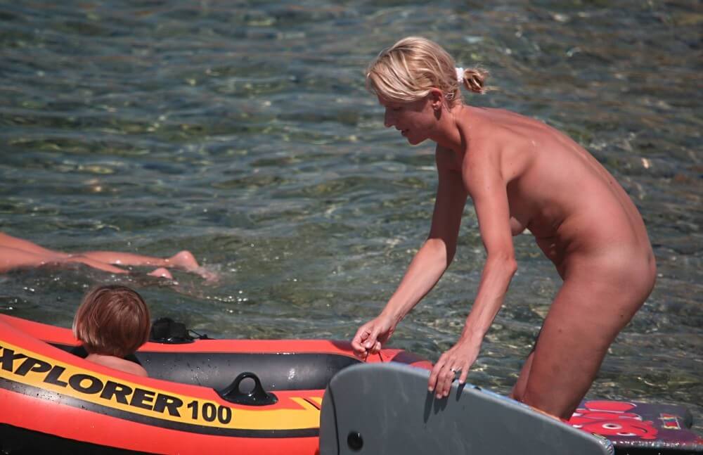 Red Boating for Two Nudists pics - Naturism is a path to self-understanding and self-acceptance