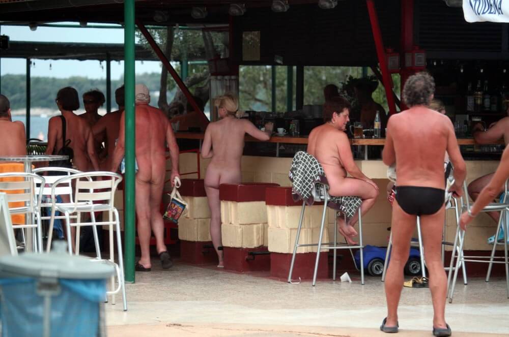 Outdoor diner view - Nudism and naturism as a philosophy of life are deeply rooted in respect