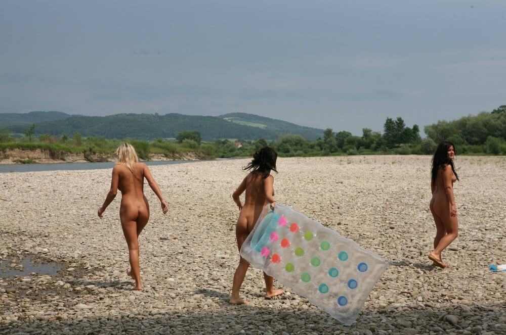 Naturist Park Floating On River photos - Naturism teaches respect for the natural world and for others