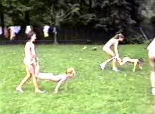 A nudist gathering at the stadium and sports - The natural beauty of the body is revealed in nudism