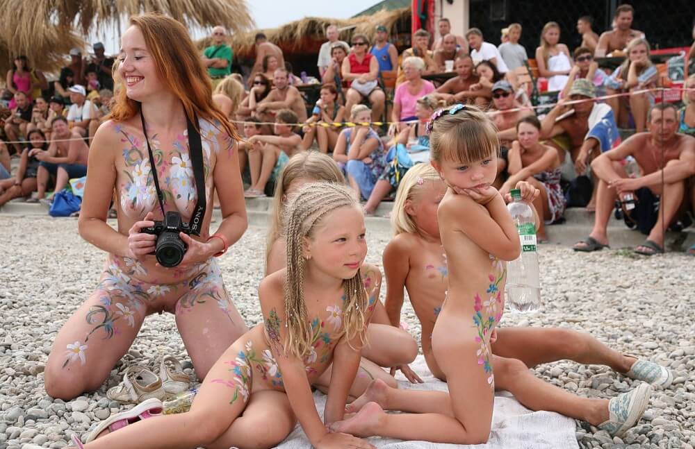 Warm Sand Relaxation photos - Getting rid of clothes