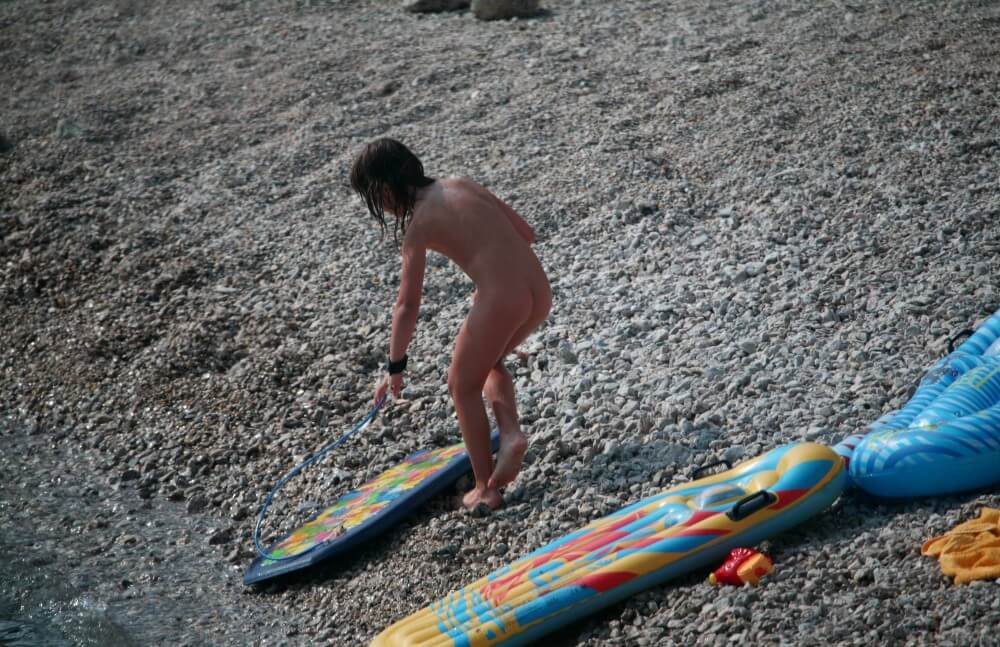 Naturist Surf Board Glides pics - Peace and tranquility are important values for advocates of naturism and nudism