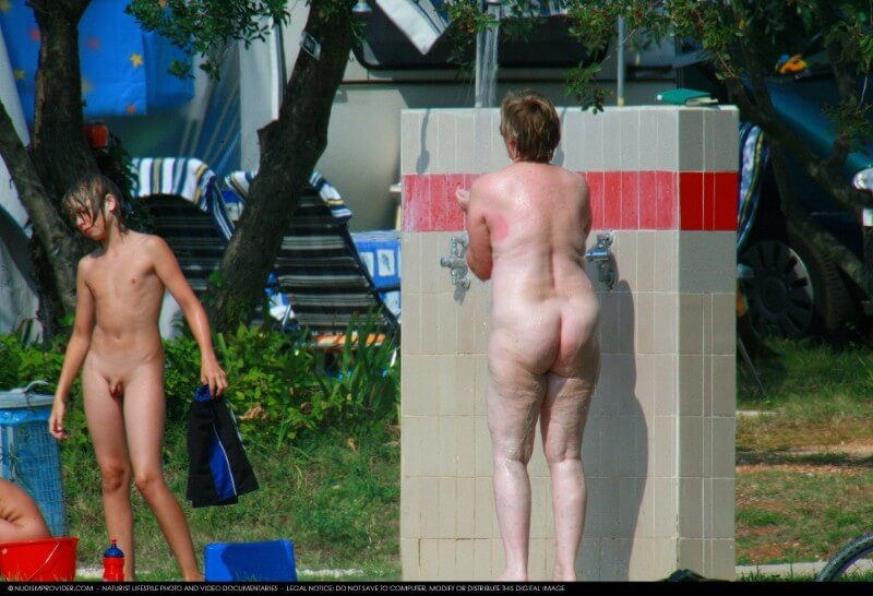 Covered in Towel Nudists-Boardwalk Biking - People who practice naturism value naturalness and simplicity