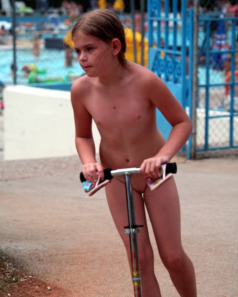Pool-Side Naturist Scooter pics - Naturism helps us understand the important fact that the body is part of nature