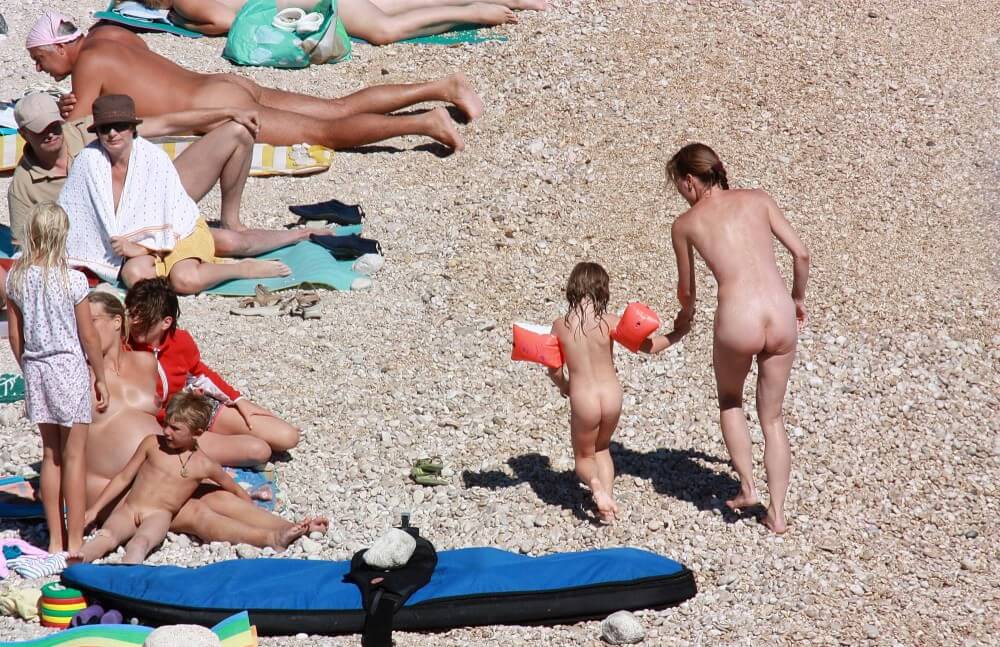 Orange Floaty Safety First Naturist pics - Naturism helps overcome fears and insecurities