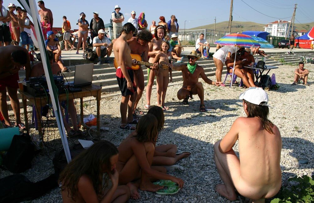 Nude Party By The Steps pics - Seeks harmony with the rhythms of nature and the environment through nudity