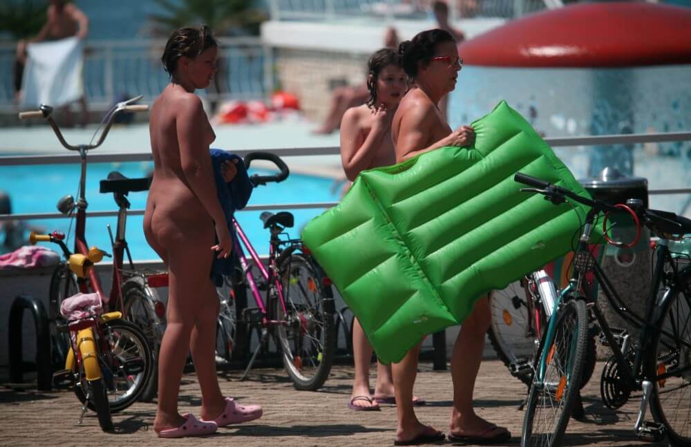 Outdoor Pool Sideliners pics - Freedom of choice and honesty are key ideas in naturism and nudism