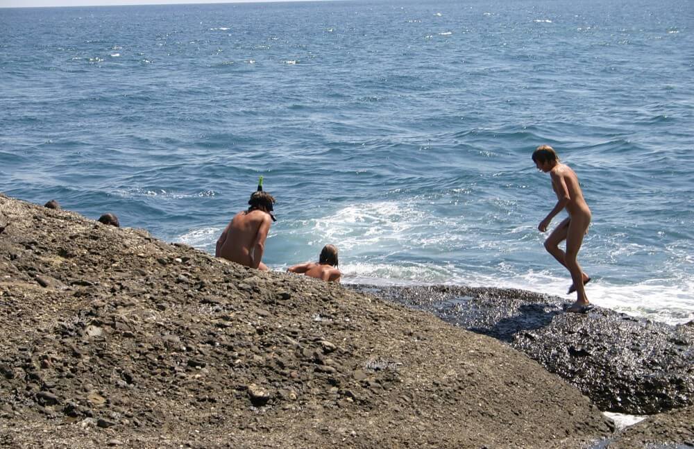 Leaning Against Hit Rocks pics - Nudity is a part of life without shame