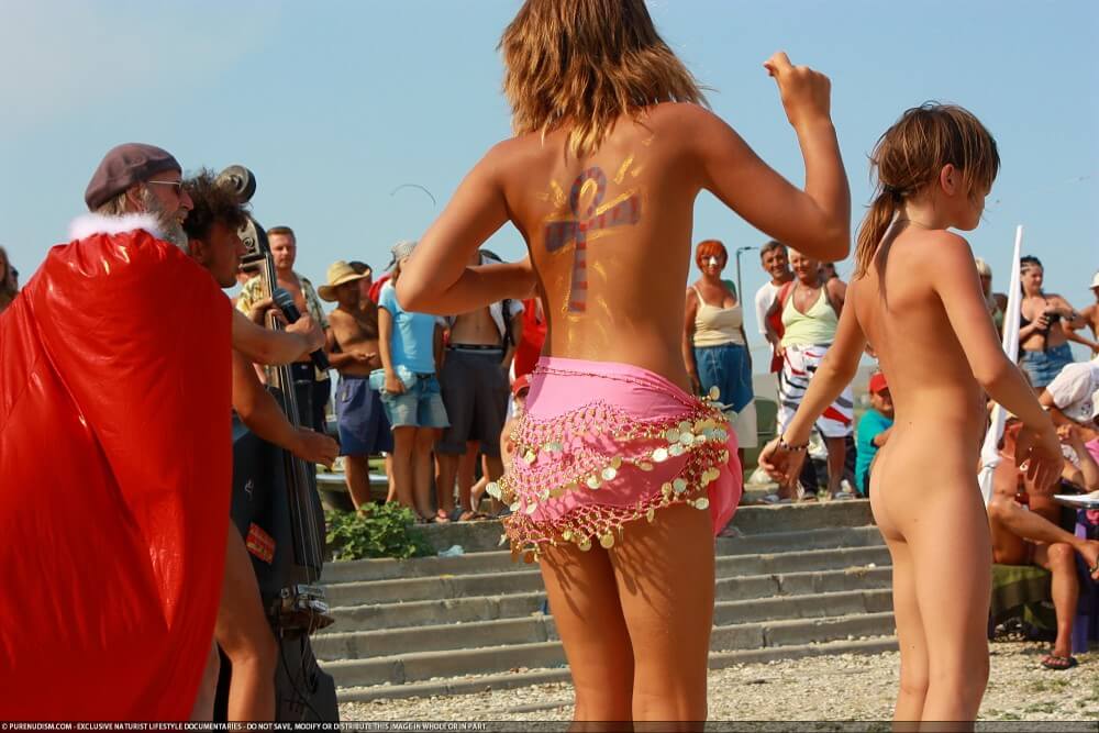 Colorful Carnival Dancing photos - The lifestyle of naturist advocates and their community